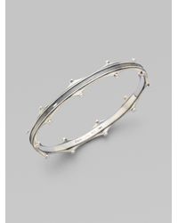 Elizabeth and James | Metallic Sterling Silver Scallop Bangle Bracelet | Lyst