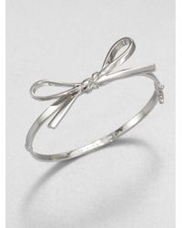 kate spade new york | Metallic Bow Bangle Braceletsilver | Lyst