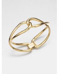 Michael Kors | Metallic Twisted Bangle Braceletgoldtone | Lyst