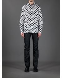 black polkadot shirt