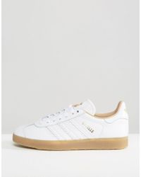 adidas white shoes gum sole