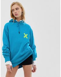 Hoodie unisexe imprimé dans le dos Collusion en coloris Blue