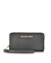 Michael Kors - Gray Jet Set Travel Black Saffiano Leather Tech Continental Wallet - Lyst
