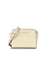Michael Kors | Natural Ecru Saffiano Leather Selma Mini Messenger Bag | Lyst
