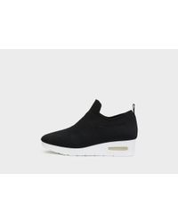 DKNY - Black Angie Slip On Low Wedge Sneaker - Lyst