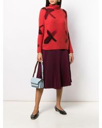 Pull à col roulé Suzusan en coloris Red