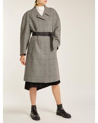 Manteau en laine mélangée à motif pied-de-poule Prada en coloris Gray