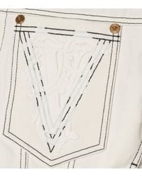Veste en jean à logo et capuche Versace en coloris White