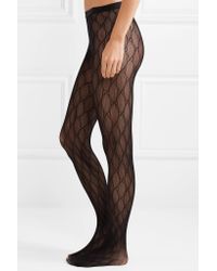 Collants "gg" Gucci en coloris Black