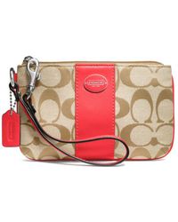 coach wristlets coral