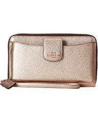 coach wallets metallic