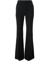 Burberry Slim Fit Flared Trousers in Black | Lyst