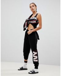 Ivy Park Logo Joggers In Black