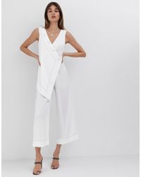 ASOS Tuta jumpsuit con strato sovrapposto e bottoni - Bianco