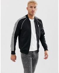 adidas originals authentic superstar track jacket in black dj2856