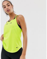 lime green nike crop top