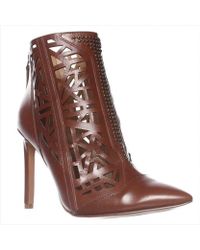 Nine west Nicoh Low Heel Tall Boots in Brown | Lyst