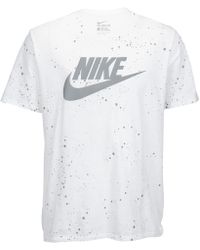 silver and white nike shirt