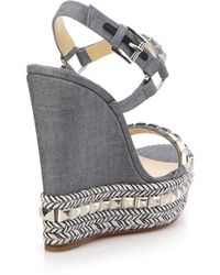 christian-louboutin-blue-silver-cataclou-studded-braid-trimmed-denim-wedge-sandals-blue-product-1-234094443-normal.jpeg