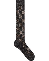 Gucci Chaussettes en lamé à motif GG - Noir