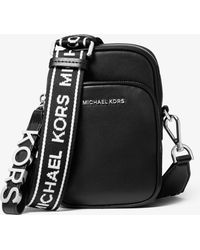 MICHAEL Michael Kors Small Leather Neon Logo Tape Crossbody Bag in Black - Save 10% - Lyst