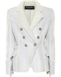 Balmain Veste en cuir et shearling - Gris
