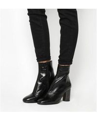 Lyst Vince Camuto Vc John Reeta Cylindrical Heel Bootie Office Admire Cylindrical Heel Lyst