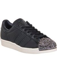 Adidas superstar degli anni '80 i formatori 3d originali di metallo nero / core core Adidas superstar degli anni '80 i formatori 3d originali di metallo nero / core core