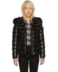 Moncler Blouson en duvet et fourrure noir Bady