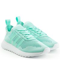 lyst adidas originali primeknit flashback scarpe in verde lyst adidas adidas adidas originali primeknit flashback scarpe in verde f116c2