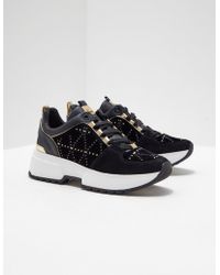 cosmo studded leather and logo trainer