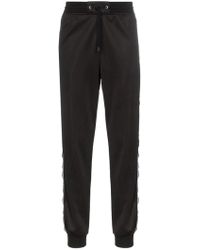 givenchy logo stripe track pants