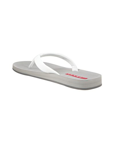 prada flip flops white