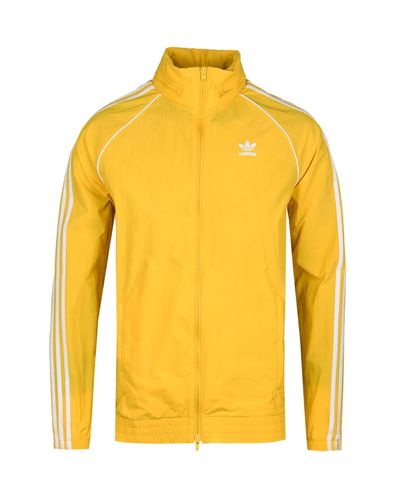 yellow adidas windbreaker