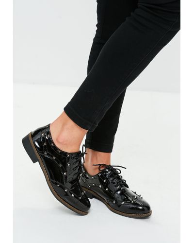 black patent t bar brogues