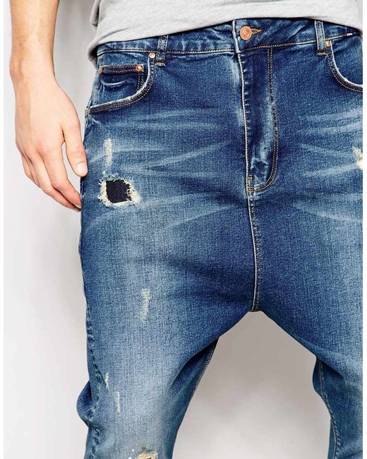 Asos Drop Crotch Jeans With Rip And Repair Detail Blue in Blue for