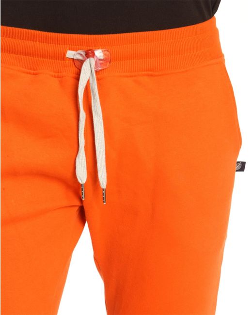 orange jogging bottoms