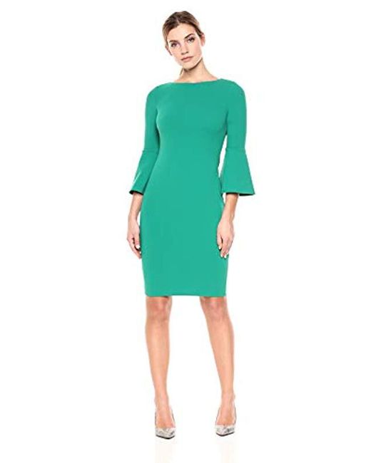 Lyst - Calvin Klein 3/4 Peplum Sleeve Sheath Dress in Green