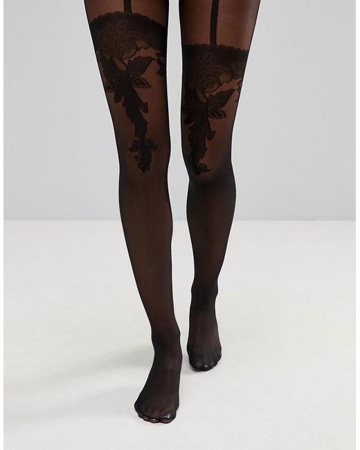 wolford suspender tights in black lyst wolford suspender tights in black lyst