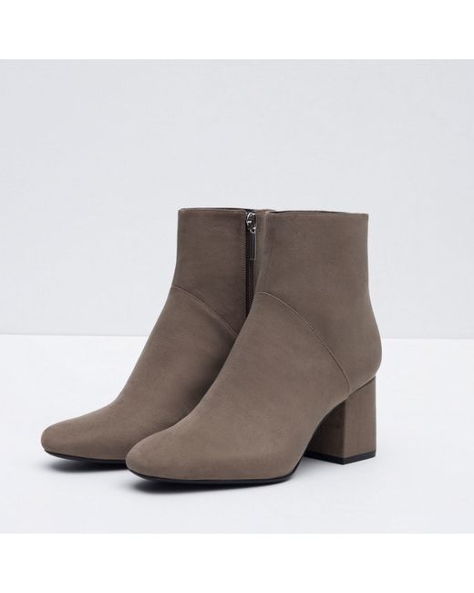 Gray high heel boots