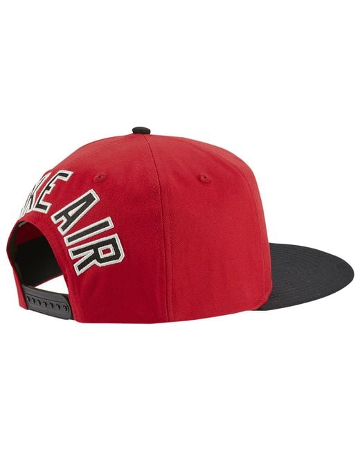 red nike cap