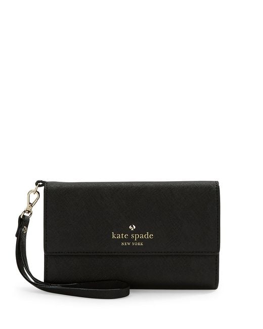 Kate spade Cedar Street Leather Tech Wristlet in Black | Lyst