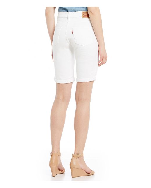 white levi cut off shorts