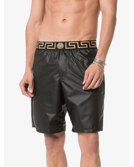 Versace Logo Waistband Swim Shorts in Black for Men Lyst