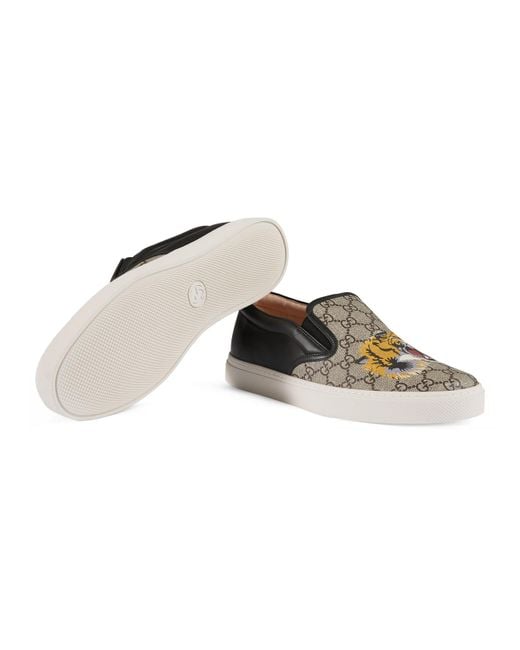 gucci tiger slip ons