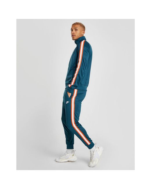 tribute track pants nike