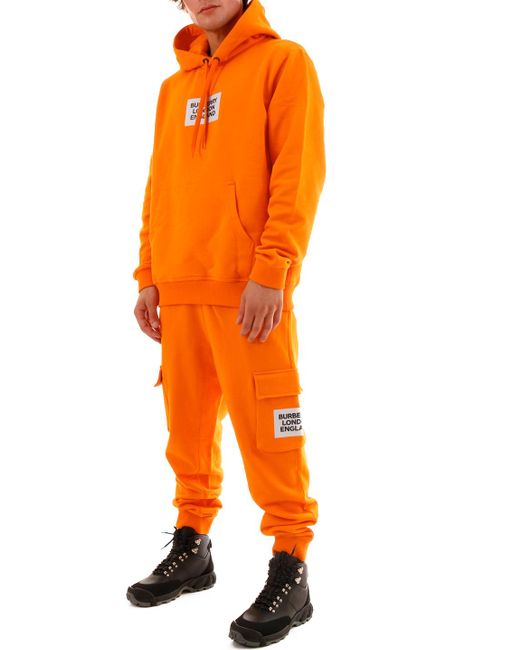 orange jogging pants