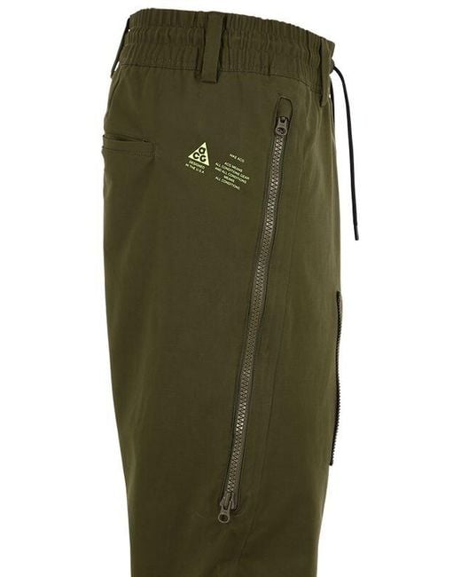 nike tech olive green pants