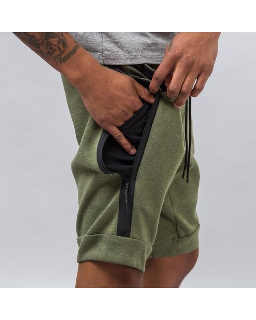 olive green nike tech fleece pants