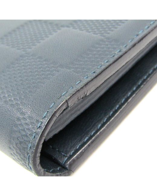 Lyst - Louis Vuitton Astral White Damier Infini Leather Brazza Wallet in Blue for Men